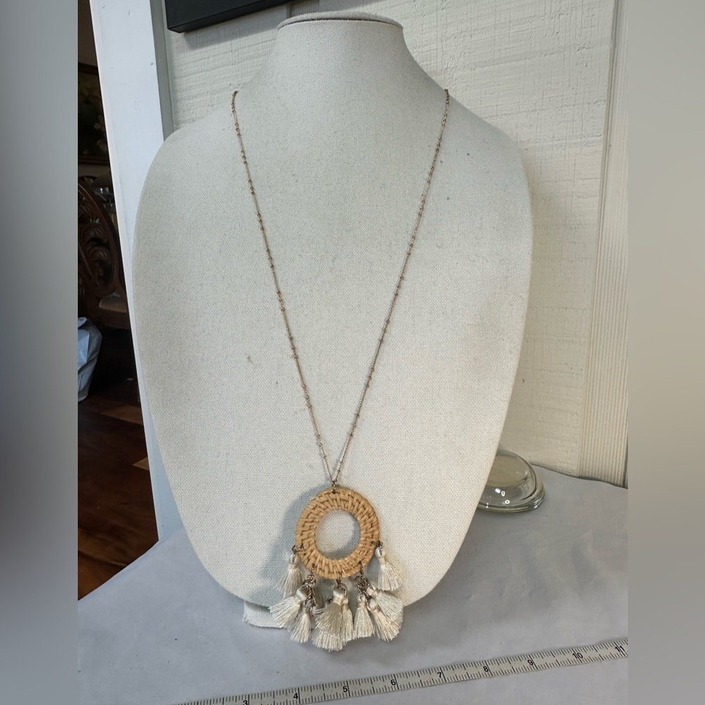 Long weaved raffia tassel goldtone necklace